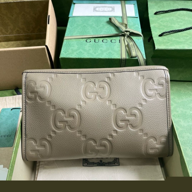 G*u*i clutch bags